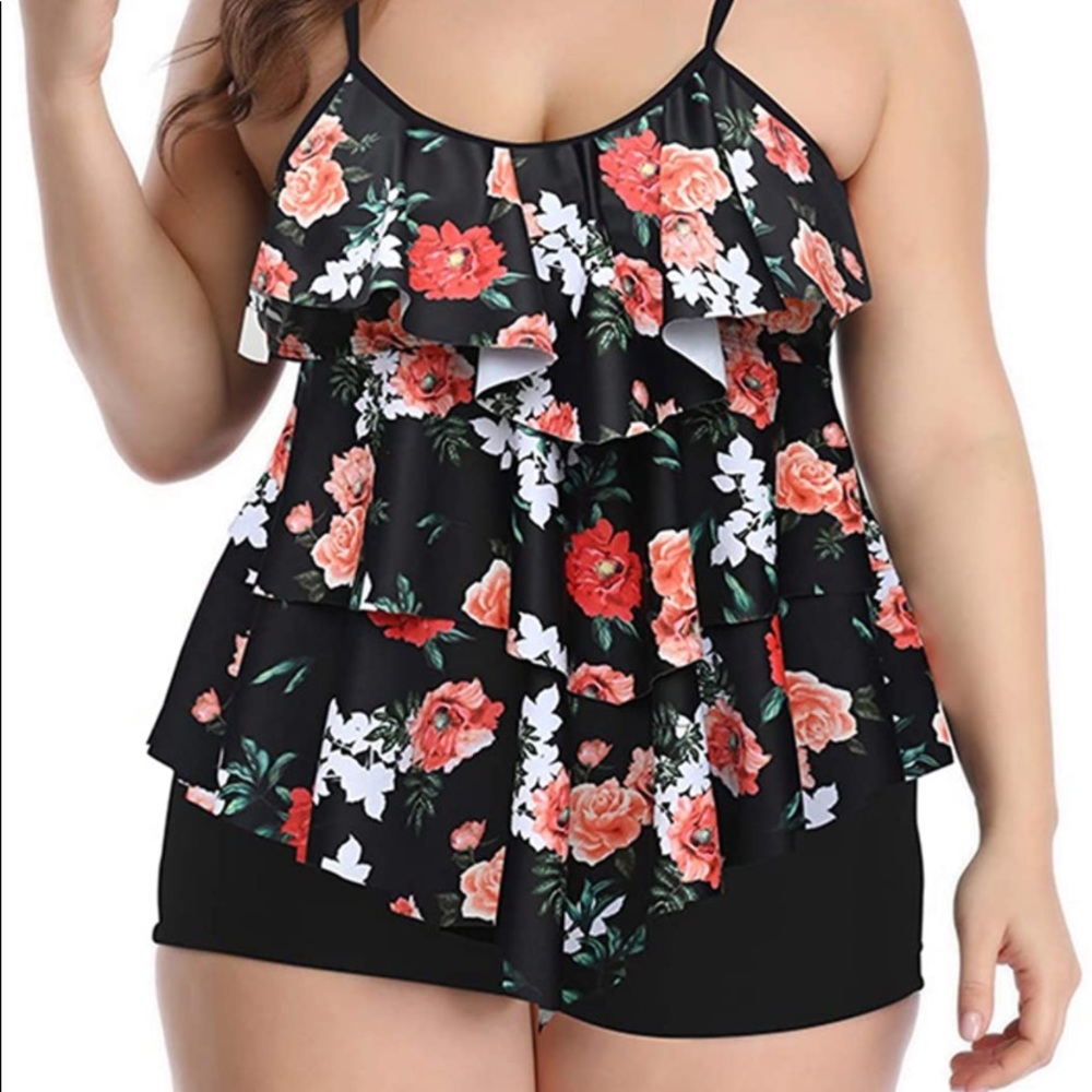 Beautiful two piece swim suit. Very flattering and in like new condition.